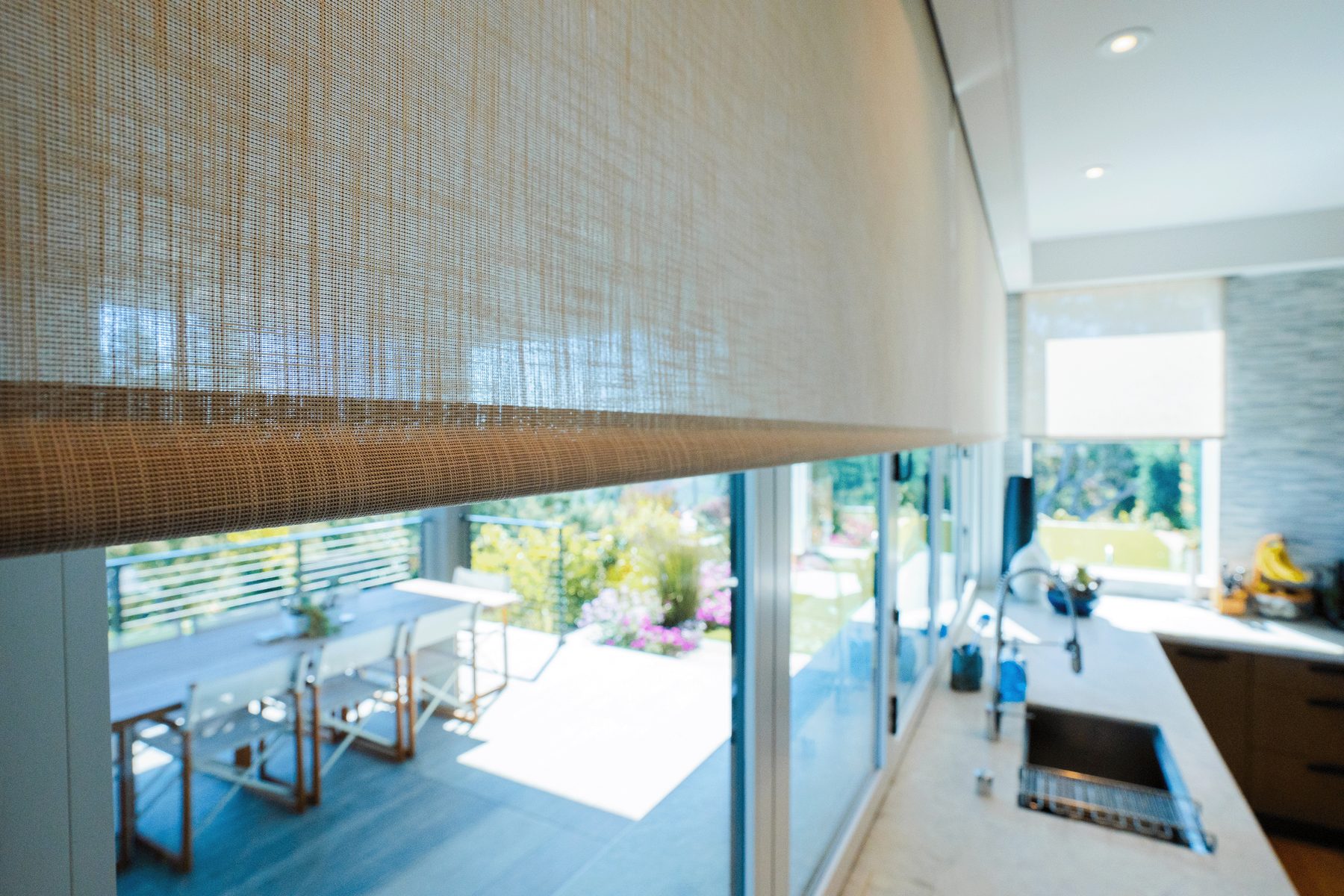 Woven shade over a kitchen window
