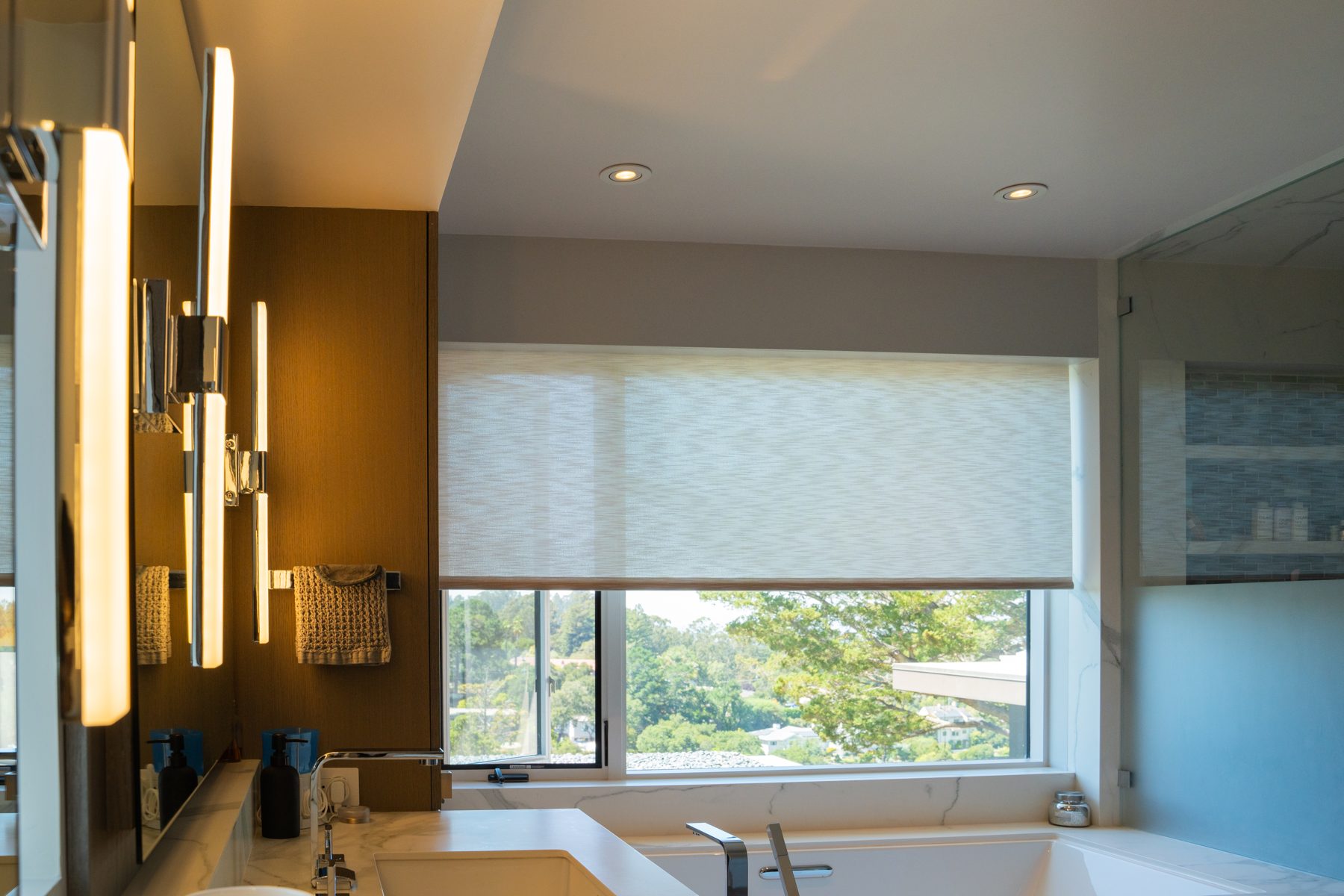 Light-filtering shades in a bathroom
