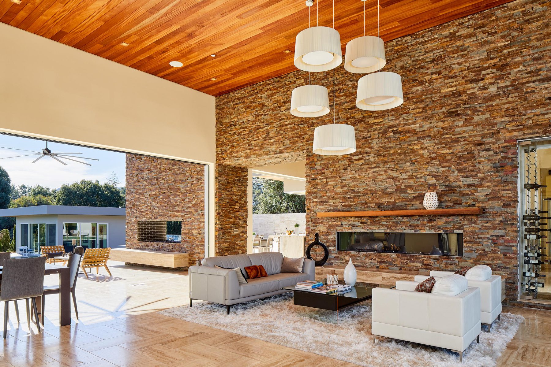 Living room with fireplace and wall-mounted TV